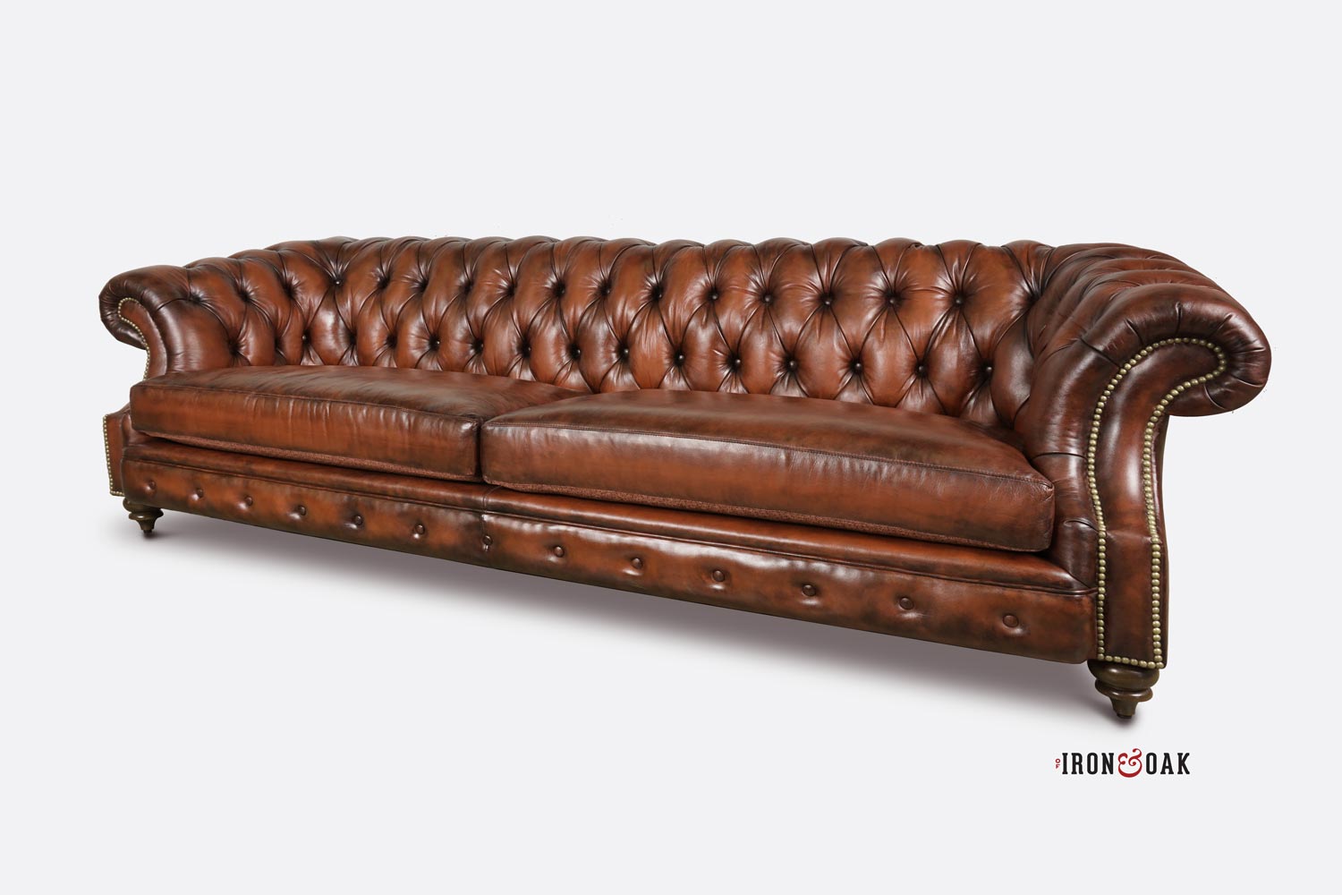 Langston High Back Scoop Arm Chesterfield Hand-stained in Cognac Leather