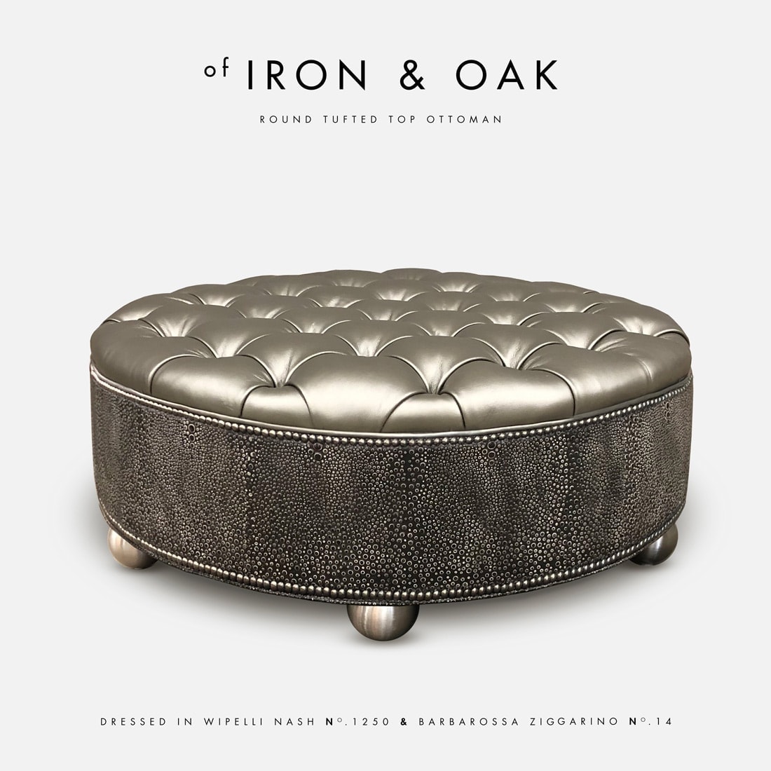 Custom designed hand-tufted ottoman in silver leather.